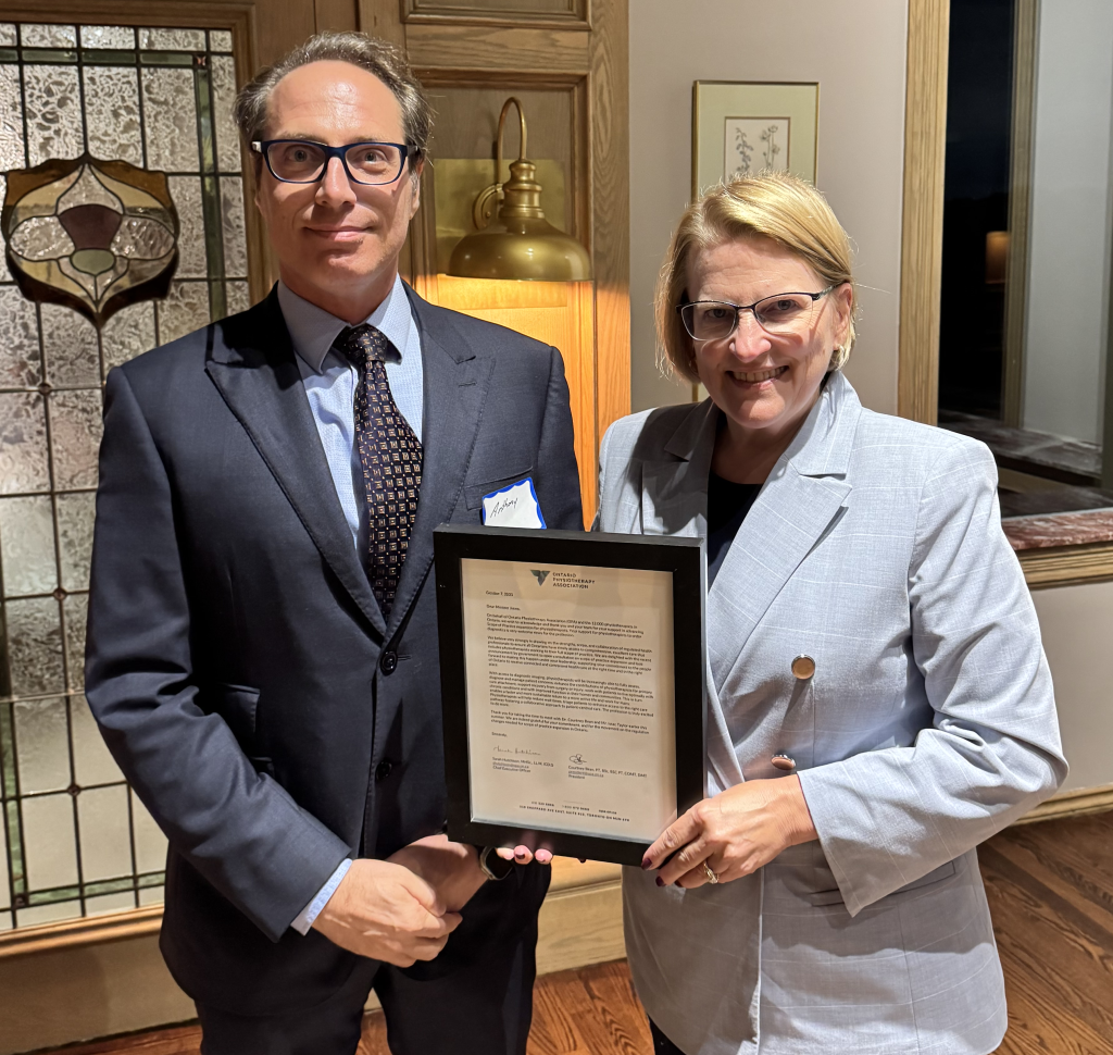 Honourable Sylvia Jones, Deputy Premier and Minister of Health with an OPA letter being handed to her by Anthony Grande, PT and OPA member